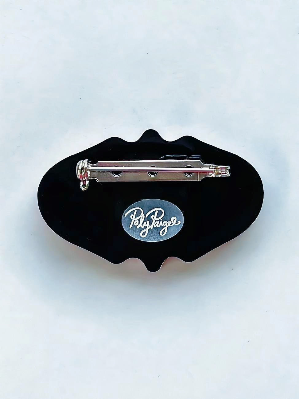 Never Trust The Living Brooch