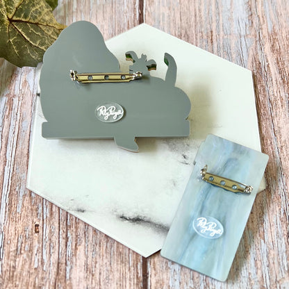 Captive Brooch Set