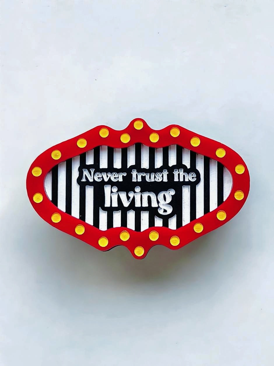 Never Trust The Living Brooch